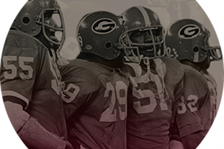 Image of UGA football players in uniform from late sixties or early seventies